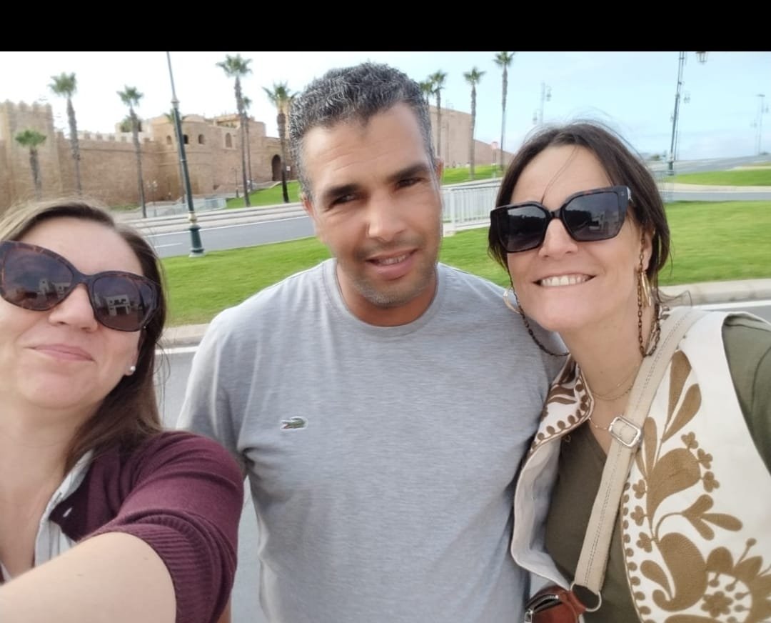 Driver with clients on the Rabat seafront